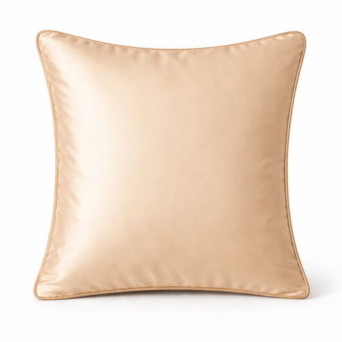 Beige satin pillow on a white background