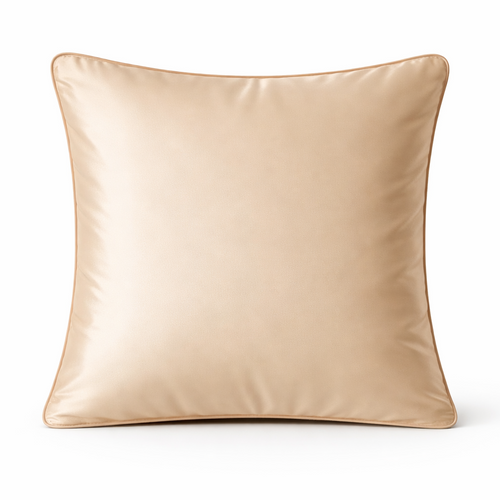 Beige satin pillow on a white background